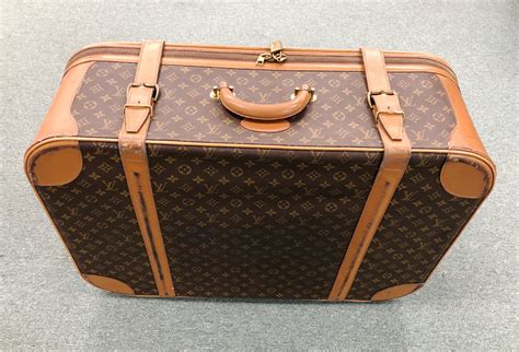 louis vuitton travel cases|louis vuitton large suitcase.